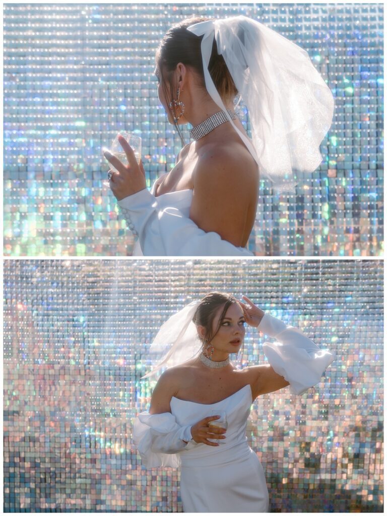 model in short veil stands in front of glittering wall by Charlotte wedding photographer