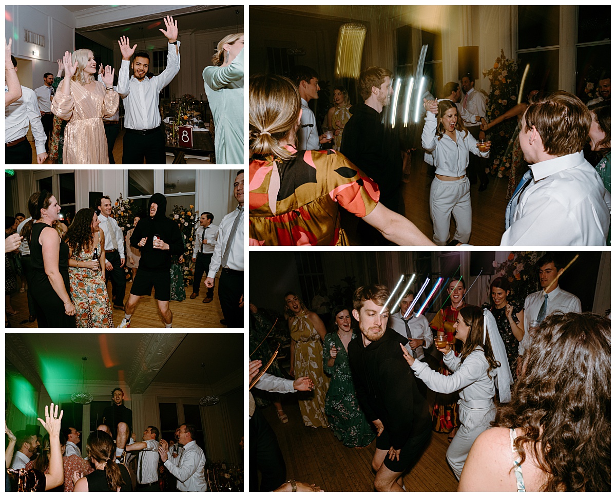 guests dance together and drink at reception by The Hazel Club