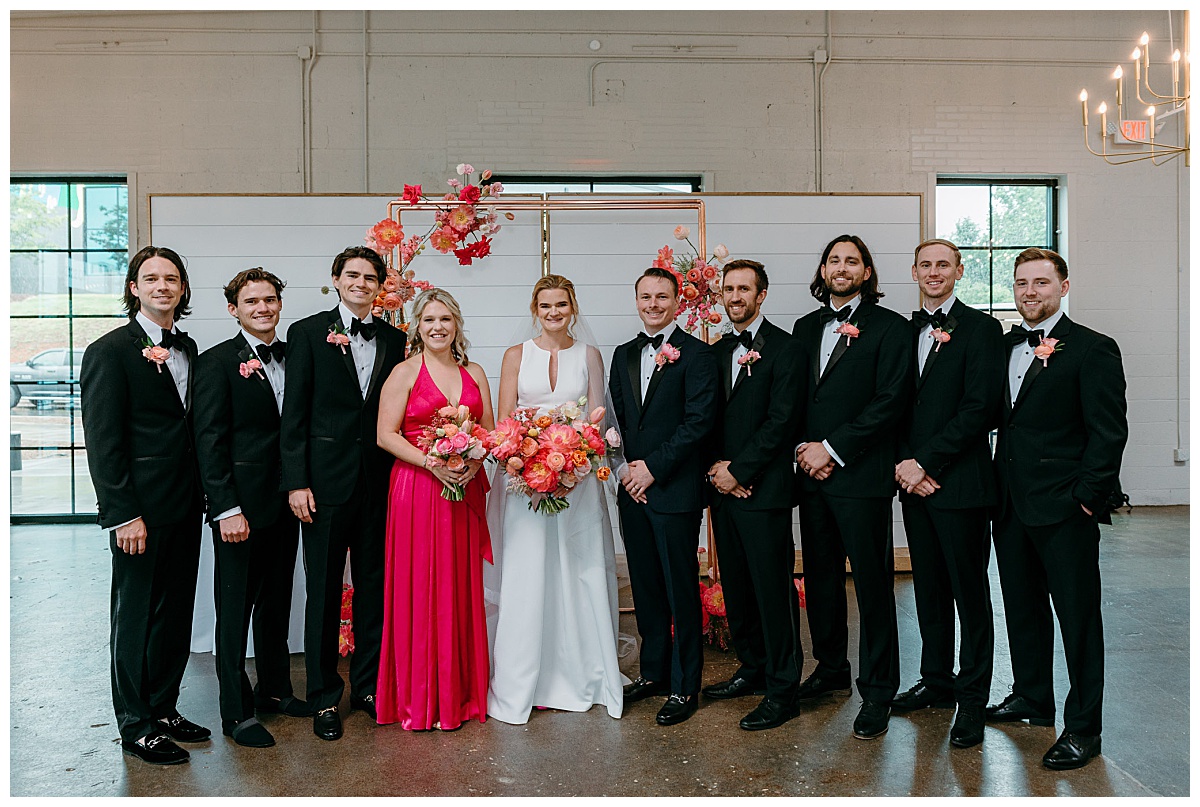 bridal party stands together at The Ruth